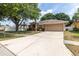 Attractive one-story home with a long driveway and appealing curb appeal at 11416 Wellman Dr, Riverview, FL 33578