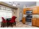 Bright kitchen with stainless steel oven and ample countertop space for meal preparation at 11416 Wellman Dr, Riverview, FL 33578