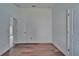Open bedroom with fresh paint, modern flooring, and a double-door closet at 12055 Cardinal Flower Dr, Riverview, FL 33579