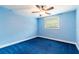 A tranquil bedroom with soft blue walls, offering a relaxing and serene ambiance at 12311 Oakwood Dr, Hudson, FL 34669