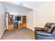 Cozy living room with large entertainment center at 12311 Oakwood Dr, Hudson, FL 34669