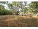 Expansive property showcasing a home, barn and a gazebo, ideal for outdoor enjoyment at 12311 Oakwood Dr, Hudson, FL 34669