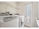Laundry room with washer and dryer at 12421 Seabrook Dr, Tampa, FL 33626