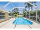 Private screened-in pool and patio area offers the perfect setting for relaxation and outdoor enjoyment at 12421 Seabrook Dr, Tampa, FL 33626
