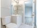 This is a bathroom with a toilet and a single sink vanity and large mirror at 1250 Charlesworth Dr, Wesley Chapel, FL 33543