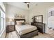 Bedroom featuring wood furniture, natural light, and a decorative rug at 13711 Lussier Ln, Spring Hill, FL 34610