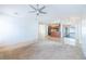 Open-concept living space offers seamless flow to the kitchen and backyard through sliding glass doors, maximizing space at 1426 Buckner Rd, Valrico, FL 33596