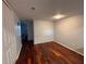 Bedroom with spacious closet space and hardwood floors at 14446 Reuter Strasse Cir # 3, Tampa, FL 33613