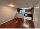 Open kitchen featuring stainless steel appliances, granite counters and warm wood cabinets at 14446 Reuter Strasse Cir # 3, Tampa, FL 33613