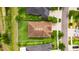 Bird's-eye view of the house featuring a well-maintained roof and spacious, fenced backyard at 17516 Bright Wheat Dr, Lithia, FL 33547