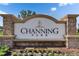 Stone entrance sign for Channing Park, surrounded by flowerbeds, welcomes residents and visitors to the neighborhood at 17516 Bright Wheat Dr, Lithia, FL 33547