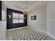 Contemporary dining room with stylish rug, modern lighting, and bright window views at 17516 Bright Wheat Dr, Lithia, FL 33547