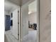 Hallway showing a bathroom and a bedroom at 17516 Bright Wheat Dr, Lithia, FL 33547