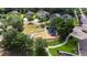 Aerial view of the community playground with swings and a playset at 17516 Bright Wheat Dr, Lithia, FL 33547