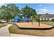 Community playground with slides, swings, and climbing structures, offering a fun and safe recreational area at 17516 Bright Wheat Dr, Lithia, FL 33547