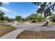 Community skate park featuring ramps, rails, and smooth concrete surfaces for skateboarding enthusiasts at 17516 Bright Wheat Dr, Lithia, FL 33547