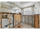 Unfinished bathroom with concrete block and wood frame and shower at 1801 Mississippi Ne Ave, St Petersburg, FL 33703