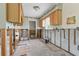 Unfinished kitchen with concrete block and wood frame and wood cabinetry at 1801 Mississippi Ne Ave, St Petersburg, FL 33703