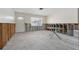 Unfinished living room with concrete block and wood frame with table and a door at 1801 Mississippi Ne Ave, St Petersburg, FL 33703