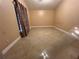 Neutral bedroom featuring tile floors, base trim and ample lighting at 18104 Sweet Jasmine Dr, Tampa, FL 33647