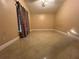 Inviting bedroom with tile floors, ceiling fan, and large window at 18104 Sweet Jasmine Dr, Tampa, FL 33647
