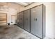 Organized garage with installed storage cabinets, providing ample space and utility at 19025 Callaway Ct, Tampa, FL 33647
