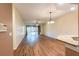 Spacious living room features wood floors, ceiling fan, and sliding doors to the lanai at 19025 Callaway Ct, Tampa, FL 33647