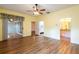 Bright main bedroom with wood floors and access to a private bathroom and lanai at 19025 Callaway Ct, Tampa, FL 33647