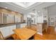 Large kitchen with an eat-in dining space, stainless steel appliances, and granite countertops at 1951 Downing Pl, Palm Harbor, FL 34683