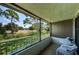 Screened in balcony overlooking the luscious golf course at 2117 Lakewood Club S Dr # 7K, St Petersburg, FL 33712