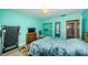 Comfortable bedroom with a double bed and a door to the bathroom with walk-in shower at 2117 Lakewood Club S Dr # 7K, St Petersburg, FL 33712