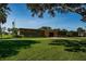 Lake Vista Pool with inviting facade, accessible entrance, and plenty of lush green space at 2117 Lakewood Club S Dr # 7K, St Petersburg, FL 33712