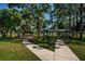 Enjoy this spacious park area with sidewalks and covered picnic tables, perfect for outdoor gatherings at 2117 Lakewood Club S Dr # 7K, St Petersburg, FL 33712