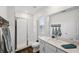 Modern bathroom featuring a glass enclosed shower and vanity at 22294 Storybook Cabin Way, Land O Lakes, FL 34637
