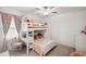 Bright bedroom featuring a combined bed with a study space at 22294 Storybook Cabin Way, Land O Lakes, FL 34637