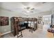 Comfortable bedroom featuring a stylish loft bed and fan at 22294 Storybook Cabin Way, Land O Lakes, FL 34637
