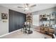 Charming bedroom featuring built in shelves and a decorative accent wall at 22294 Storybook Cabin Way, Land O Lakes, FL 34637