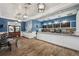 Community center cafe featuring ample counter space, dining area, and inviting decor at 22294 Storybook Cabin Way, Land O Lakes, FL 34637