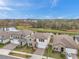 Beautiful homes with lake views, manicured lawns and landscaping creating a serene and picturesque neighborhood at 22294 Storybook Cabin Way, Land O Lakes, FL 34637
