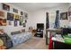 Comfortable bedroom showcasing creative wall decorations and a cozy bed at 2449 Moon Shadow Rd, New Port Richey, FL 34655