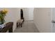 Entryway with tiled floors, bench and decor at 2449 Moon Shadow Rd, New Port Richey, FL 34655