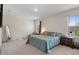 Cozy main bedroom with large windows and neutral decor at 2449 Moon Shadow Rd, New Port Richey, FL 34655