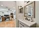 Bathroom with gray vanity and view to the home office at 2667 Aspen Ct, Palm Harbor, FL 34684