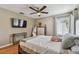Inviting bedroom with wood floors and modern furnishings throughout at 2667 Aspen Ct, Palm Harbor, FL 34684