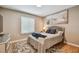 Bedroom with plush queen bed, textured rug, and large window at 2667 Aspen Ct, Palm Harbor, FL 34684