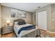 Bedroom featuring neutral walls, queen bed, and double-door closet at 2667 Aspen Ct, Palm Harbor, FL 34684