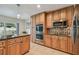 Gourmet kitchen featuring stainless steel appliances and granite countertops at 2667 Aspen Ct, Palm Harbor, FL 34684