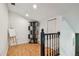 Charming loft space with unique shelving, an easel, and convenient closet, offering a versatile area for relaxation at 2667 Aspen Ct, Palm Harbor, FL 34684