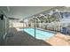 Gorgeous covered pool and patio area, perfect for entertaining guests at 2667 Aspen Ct, Palm Harbor, FL 34684