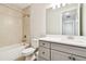 Clean bathroom featuring a shower-tub combination and a vanity with a white countertop at 2973 Breezy Meadows, Clearwater, FL 33760